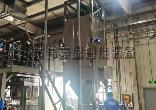 鈣粉自動噸袋投料站+管鏈式提升機現場
