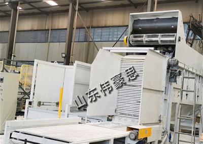 鈣粉垛料拆垛拆包機(jī)是怎樣完成拆垛拆包任務(wù)的？