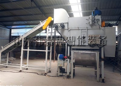 碳酸鈣粉自動(dòng)破袋機(jī)，自動(dòng)拆包卸料裝置現(xiàn)場(chǎng)