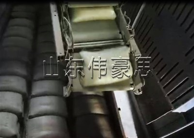 水泥全自動裝車機(jī)，機(jī)器人自動裝車設(shè)備